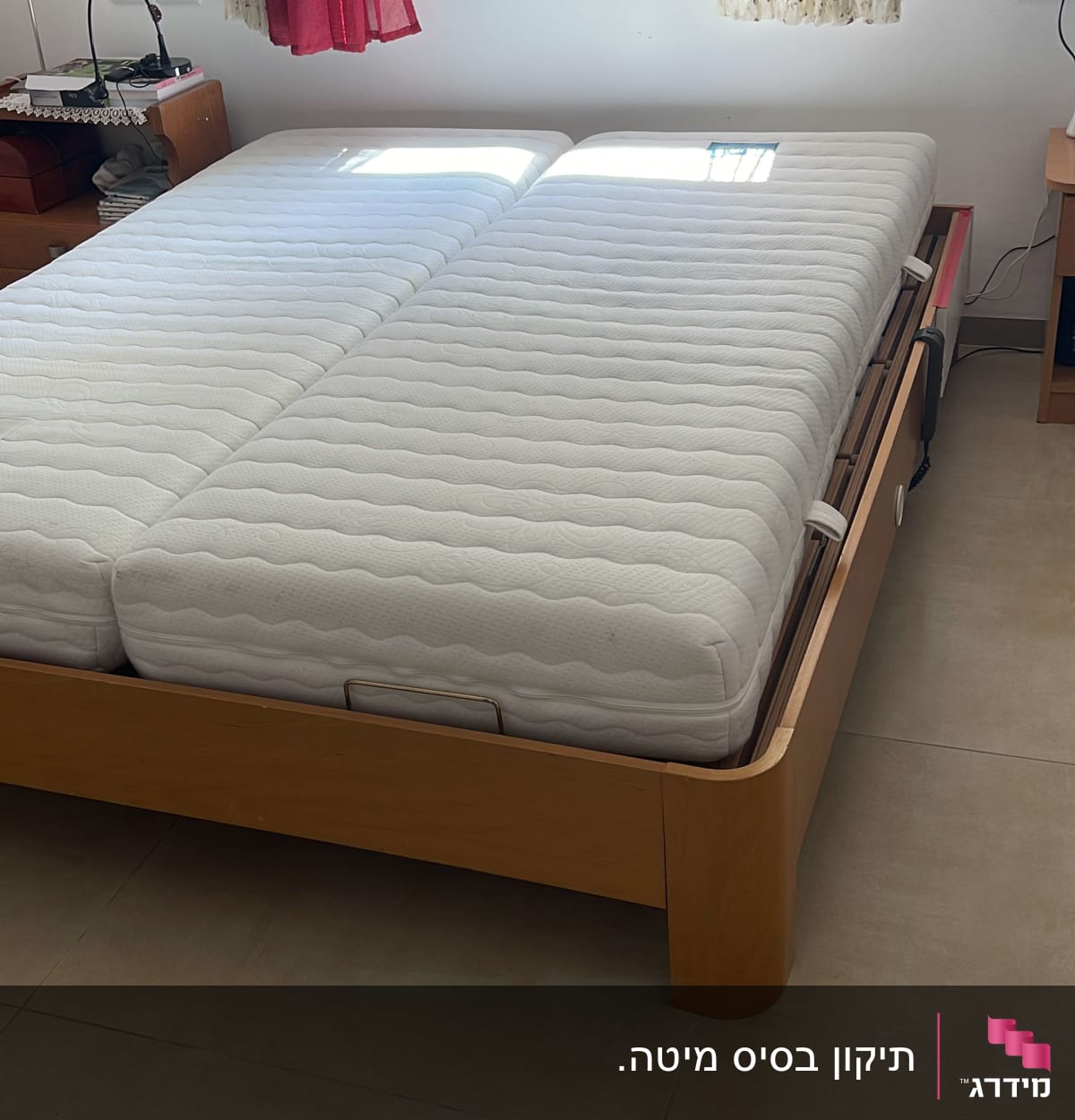 מיטה מתכווננת עם שלט בצד